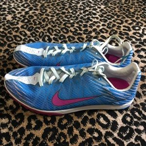 Womens Nike track shoes with spike remover tool
